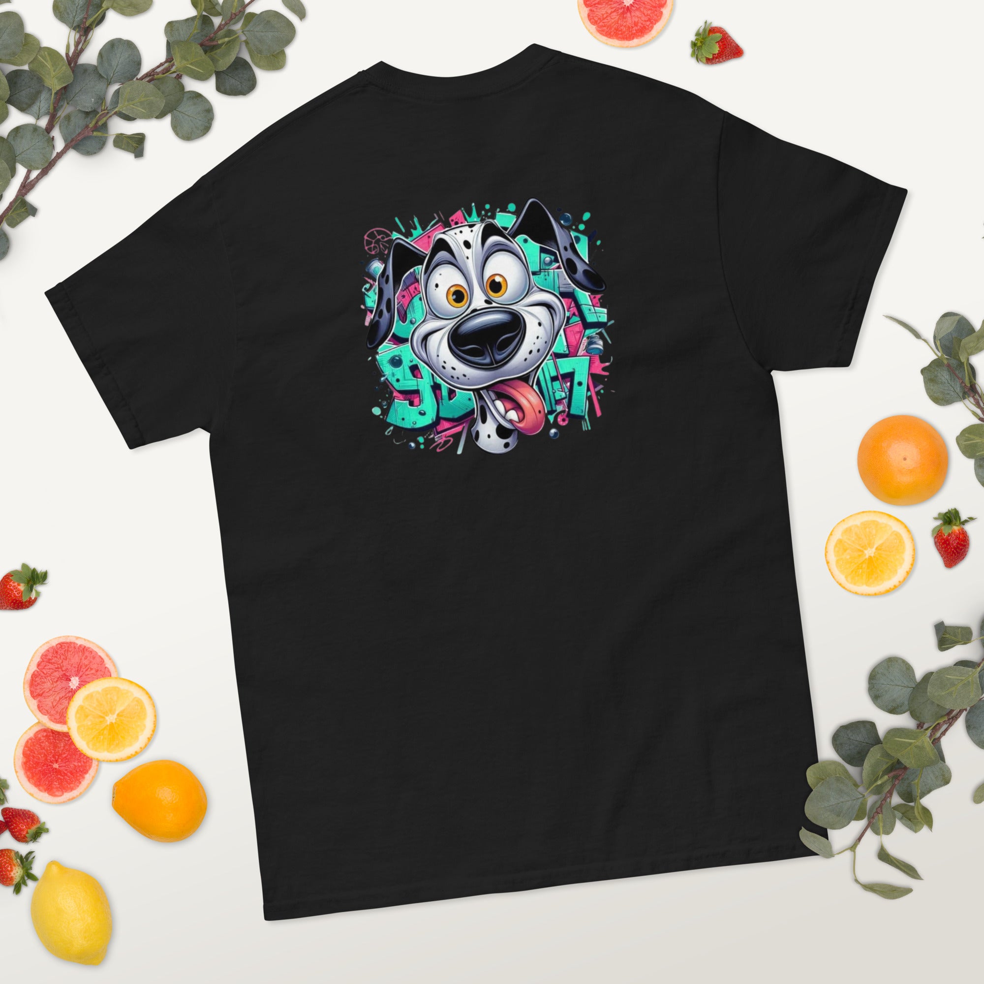 Black t-shirt with a colorful dog graphic on a white background with fruits and leaves.
