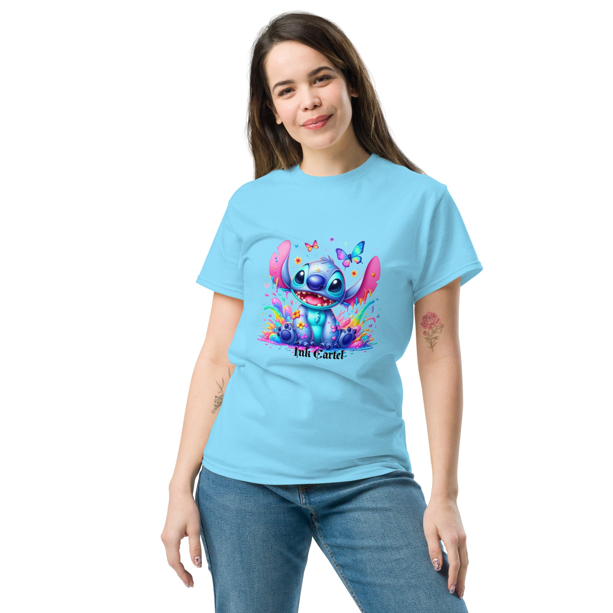  Ink Cartel exclusive streetwear design showing a cartoon-style blue character splashing through dripping black and colorful ink, creating a bold graffiti-inspired visual on a premium t-shirt