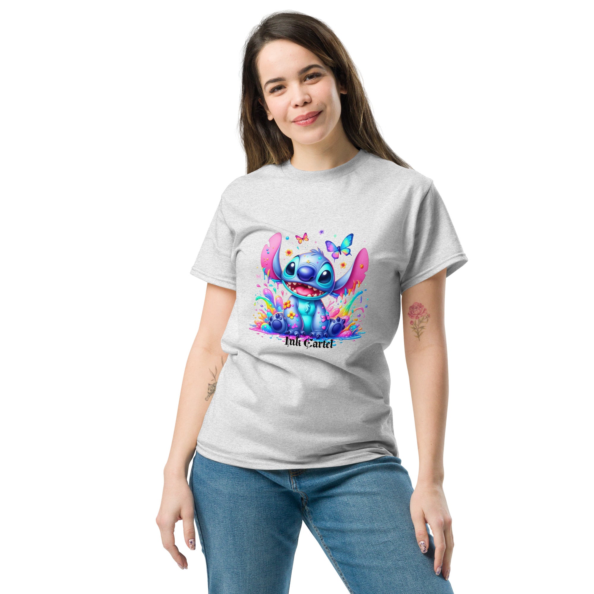  Ink Cartel exclusive streetwear design showing a cartoon-style blue character splashing through dripping black and colorful ink, creating a bold graffiti-inspired visual on a premium t-shirt
