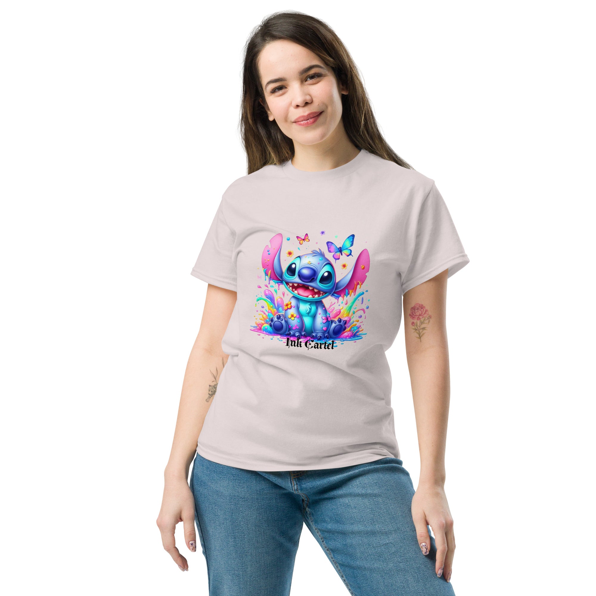  Ink Cartel exclusive streetwear design showing a cartoon-style blue character splashing through dripping black and colorful ink, creating a bold graffiti-inspired visual on a premium t-shirt
