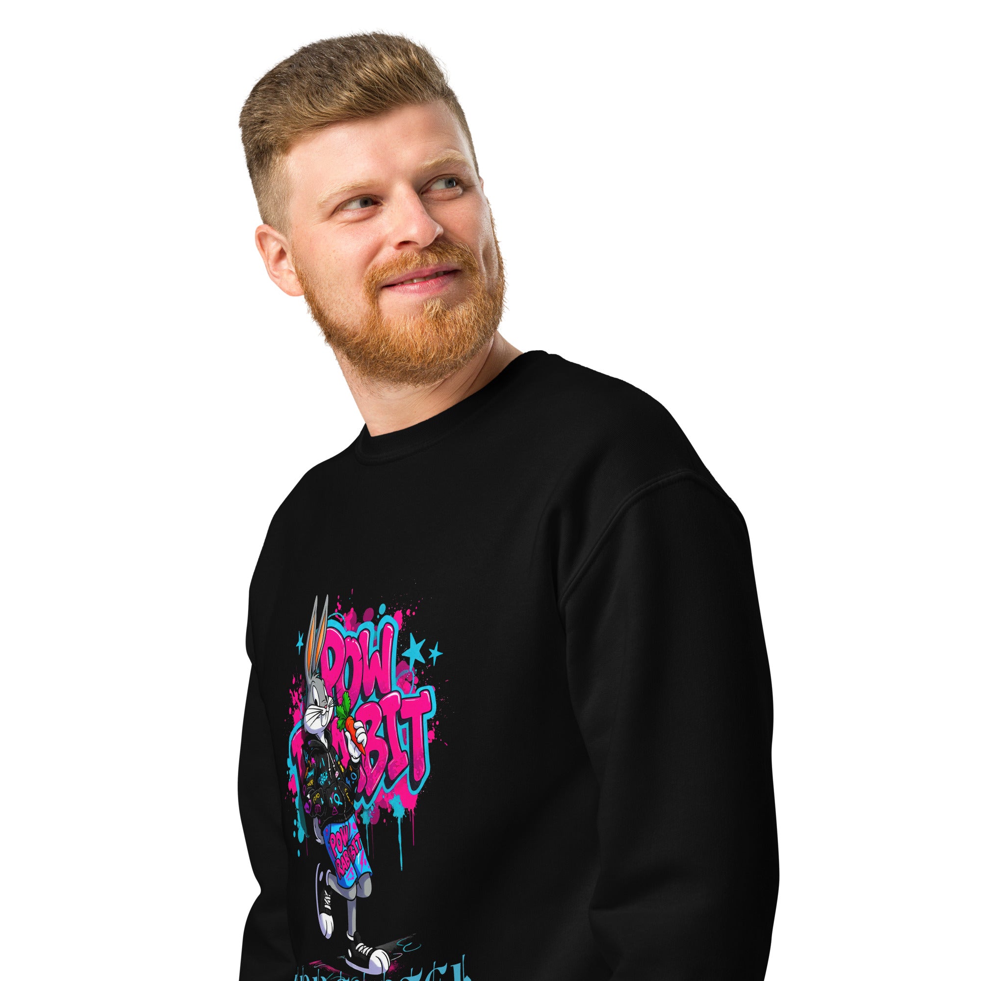 Man wearing a black sweatshirt with colorful graphic design on a white background