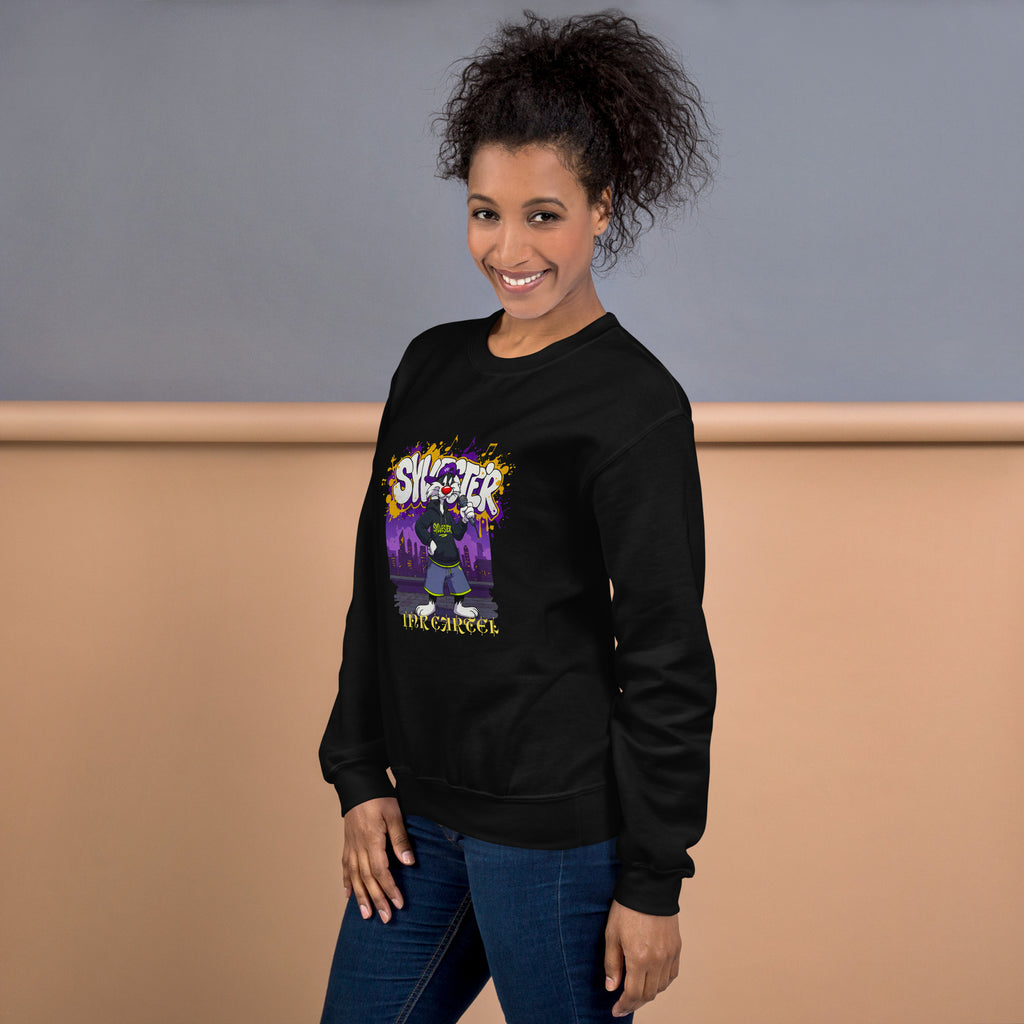 Woman wearing a black sweatshirt with a colorful graphic design on a plain background