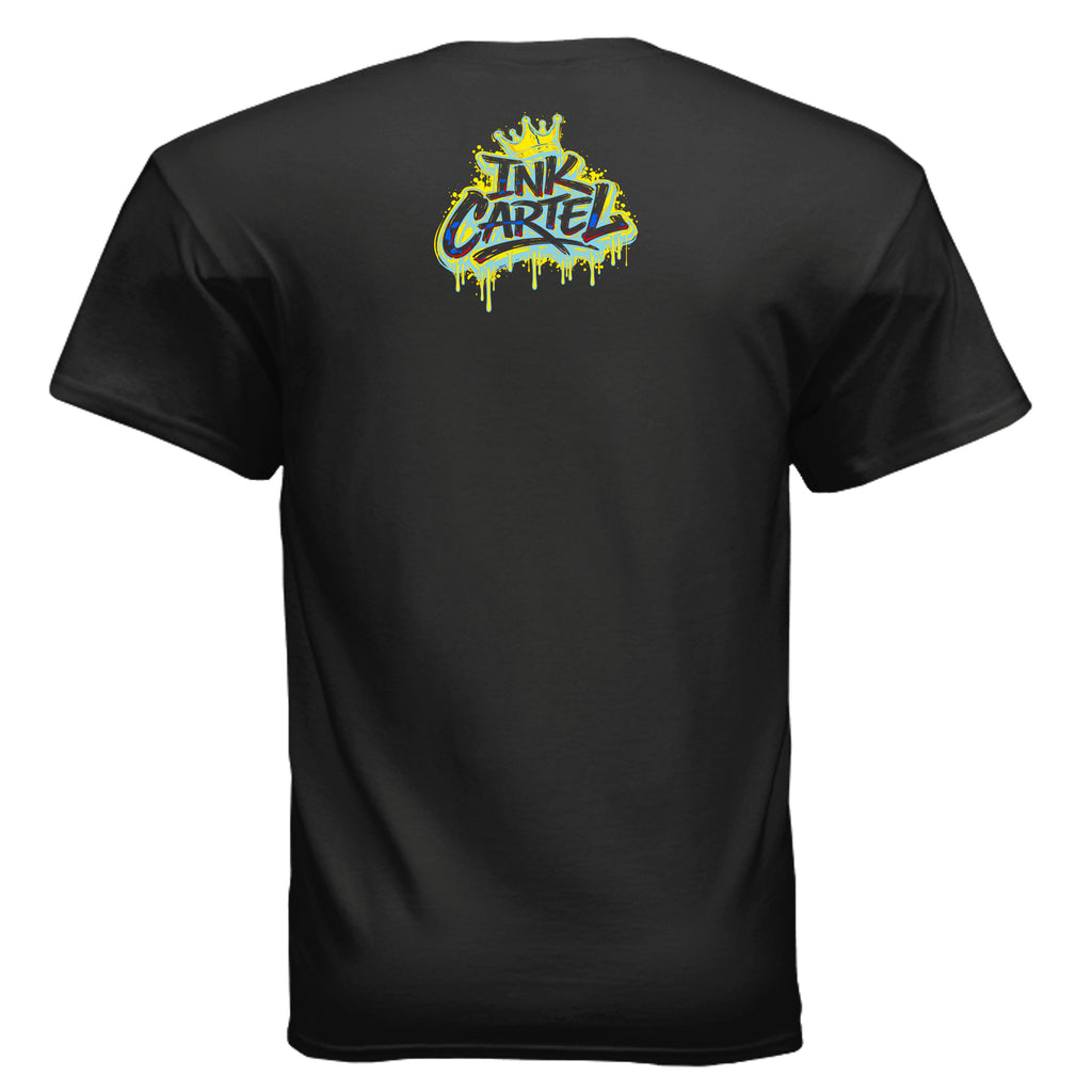 Comic-inspired superhero leaping toward the viewer with black ink splashing behind him on an Ink Cartel t-shirt.