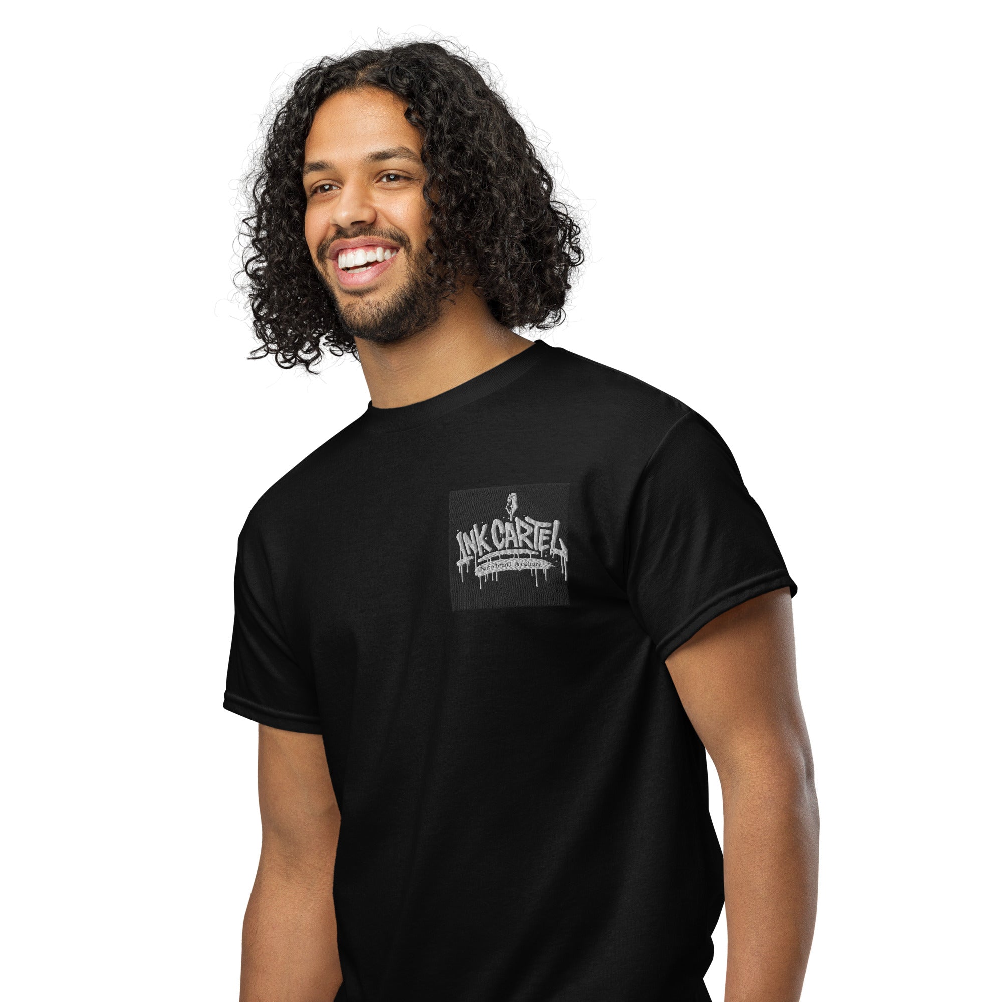 Man wearing a black t-shirt with a logo on a white background