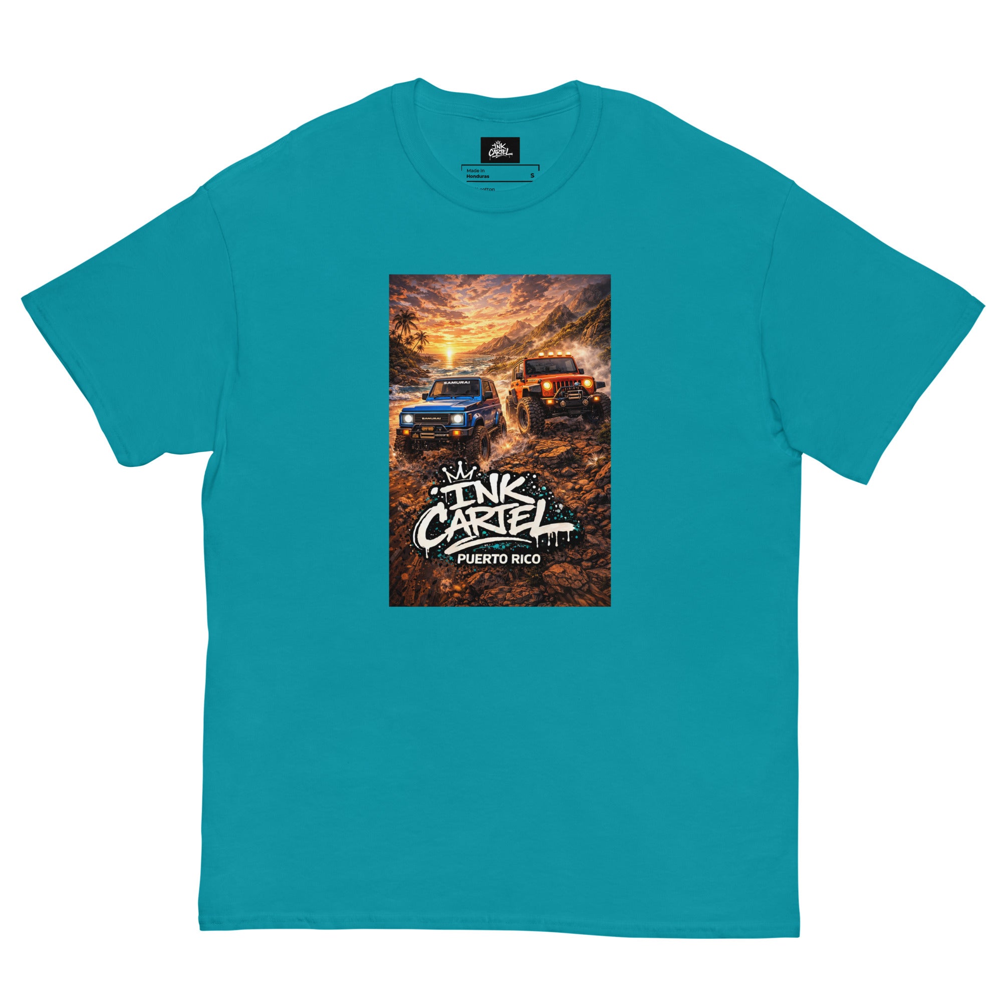 Teal t-shirt with a graphic of two trucks and 'Ink CarTEL Puerto Rico' text on a white background